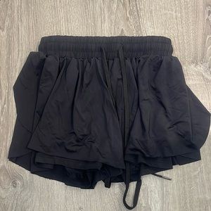 Black ruffle/flowy shorts.  Size medium